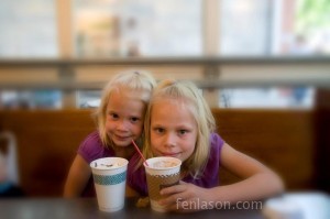 Sisters enjoying hot chocolate