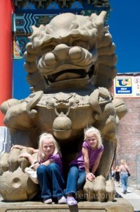 Alyssa and Carlye climbing on the China Town entrance