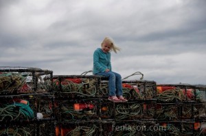 Alyssa atop crab traps