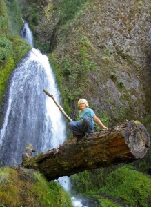 Jordan climbing a log above Wahkeena Falls