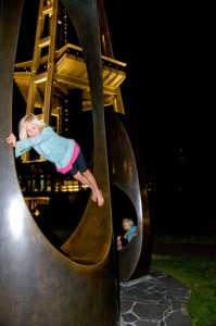 Carlye playing on the Space Needle sculptures