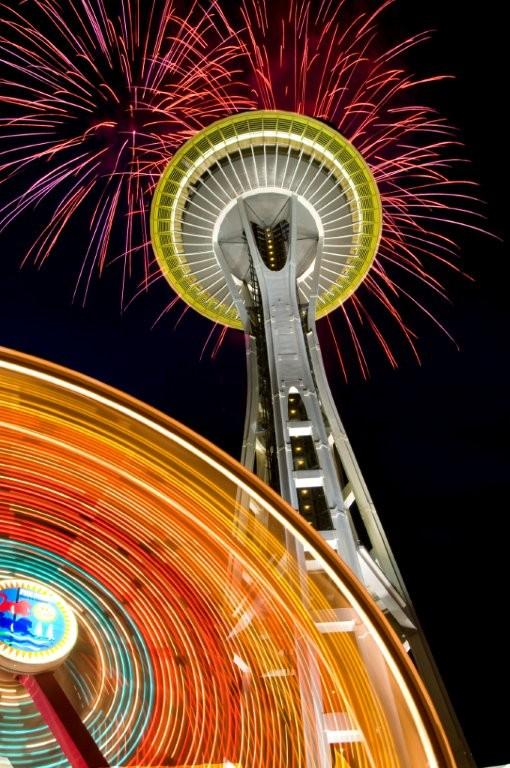 Space Needle and Ferris Wheel with fireworks