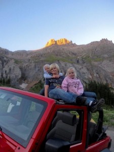 Jordan, Carlye, & Alyssa on the jeep at Yankee Boy Basin