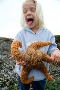 Alyssa holding a large starfish