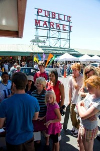 Kids watching a magician at Pikes Place Market