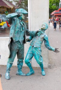 Street performers dressed like statues
